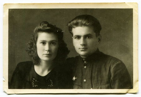 USSR - CIRCA 1950s: An antique photo shows studio portrait of man and womanのeditorial素材
