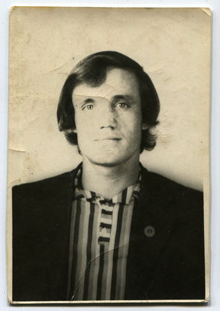 USSR - CIRCA 1960s: An antique photo shows  portrait of a young man, USSR, circa 1960sのeditorial素材
