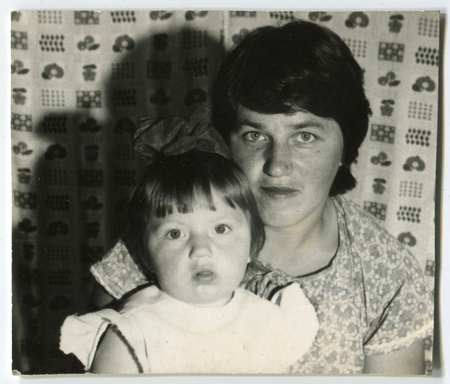 USSR - CIRCA 1980s: An antique photo shows  mom and little daughter, USSR, circa 1980sのeditorial素材