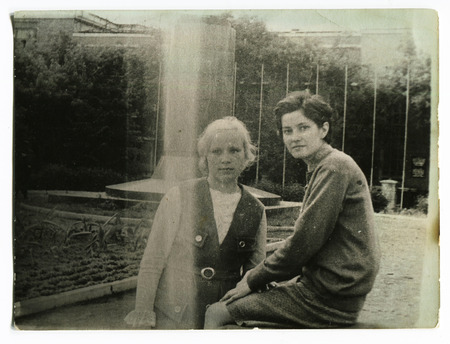 Ussr - CIRCA 1970s: An antique Black & White photo show two girlのeditorial素材