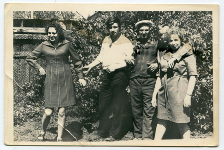 Ussr - CIRCA 1970s: An antique Black & White photo show family portrait in the gardenのeditorial素材