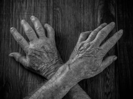 hands of the old manの写真素材