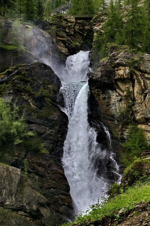 view of waterfalls of italian alpsの写真素材