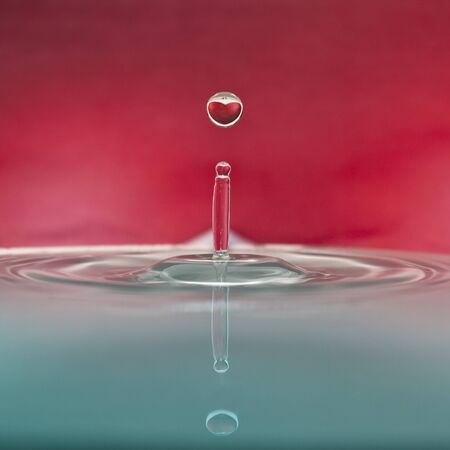 a nice view of an heart in a drop of waterの写真素材