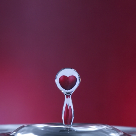 reflection of an heart in a drop of waterの写真素材