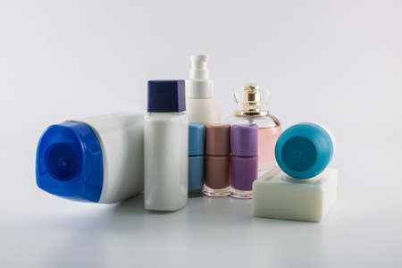 Care set consisting of shampoo, parfume, lotion, soap, nail polish, sun cream. Isolated on white backgroundの写真素材