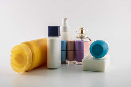 Care set consisting of shampoo, parfume, lotion, soap, nail polish, sun cream. Isolated on white backgroundの写真素材