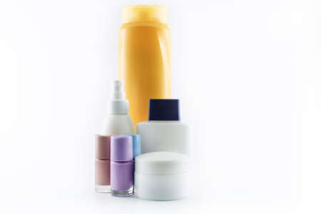 Shampoo, sun cream, nail polish, parfum. Isolated on white background.の写真素材