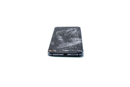 Broken glass mobile phone. White backgroundの写真素材