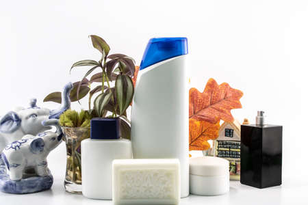 Cosmetic kit. Male care. Personal care. White and flowers background.の写真素材