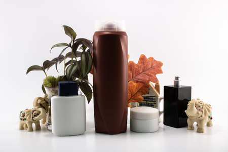 Cosmetic kit. Male care. Personal care. White and flowers background.の写真素材