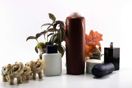 Cosmetic kit. Male care. Personal care. White and flowers background.の写真素材