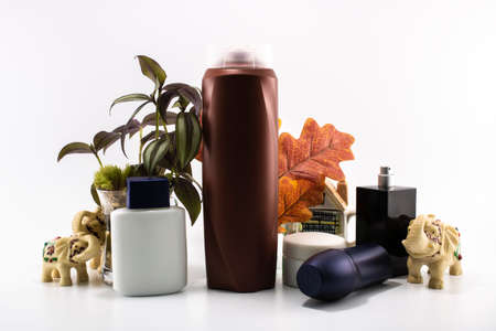 Cosmetic kit. Male care. Personal care. White and flowers background.の写真素材