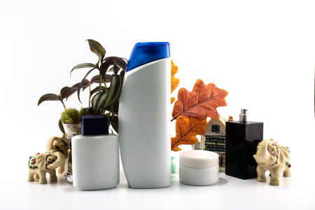 Cosmetic kit. Male care. Personal care. White and flowers background.の写真素材