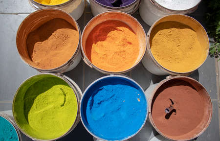 Powder coating cans. Various colors. Photographed on a sold out counter.の写真素材