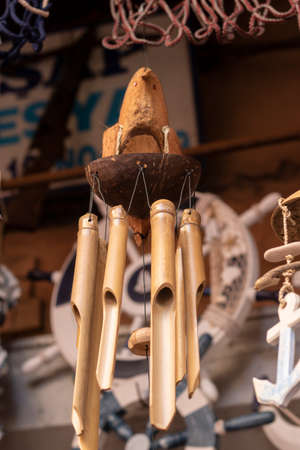 Hanging wooden ornament. The rods sound in the wind.の写真素材