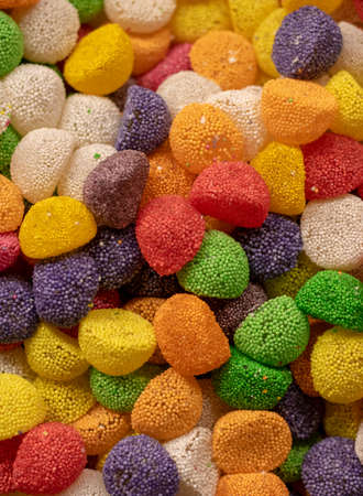 Jellybeans in different shapes. Close-up shot in front of store.の写真素材