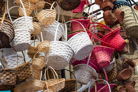 Handmade wooden baskets of different colors and types. Different sizes and colors.の写真素材