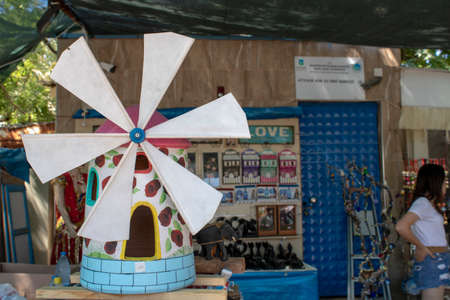 They sell small windmill as a souvenir. The island of Cunda was taken by the coast.の写真素材