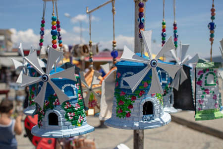 They sell small windmill as a souvenir. The island of Cunda was taken by the coast.の写真素材