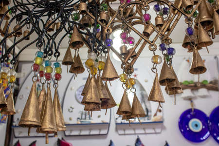 Decorative heart illustration and ornaments in gold color. The bottom has little bells. Taken inside the store.の写真素材
