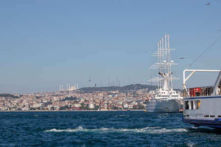 Big tourist ship docked at the seaside harbor.の写真素材