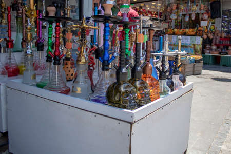 hookah in different colors in front of the stores that sell hookah products.の写真素材