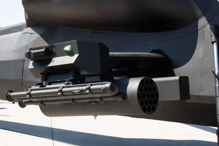 Helicopter gun close-up. In black.
