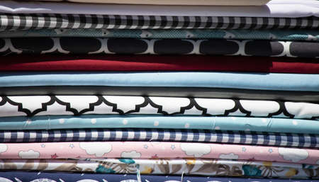 Fabrics in different patterns lined up in a row.の写真素材