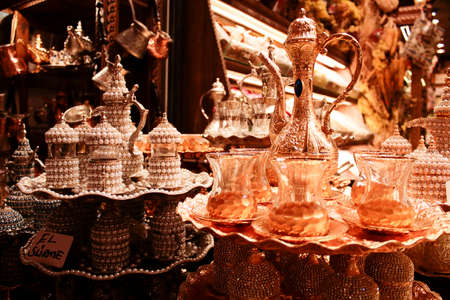 Tea set in front of store. Lined up in a row. It has patterns of Eastern culture.の写真素材