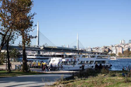 Istanbul, Turkey - October-16,2019: Istanbul, Turkey, Golden Horn Halic Metro Bridge at closed sky. The bridge connects the Beyo lu and Fatih districts on the European side of Istanbulのeditorial素材