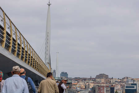Istanbul, Turkey - October-16,2019: Istanbul, Turkey, Golden Horn Halic Metro Bridge at closed sky. The bridge connects the Beyo lu and Fatih districts on the European side of Istanbulのeditorial素材