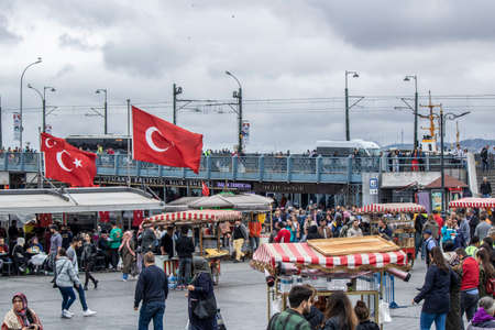 Istanbul, Turkey - October-5.2019: Eminonu Square is a very old square. It is crowded around the...