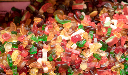 A variety of sweet candy jelly beans in different colors.の写真素材