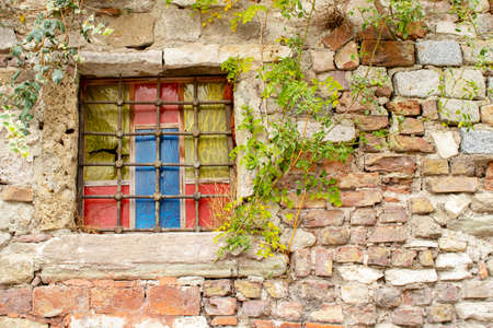 Recycled windows of old type masonry building.の写真素材