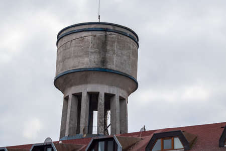 Water tower close-up. It is used where water pressure is not sufficient. Made of concrete.の写真素材
