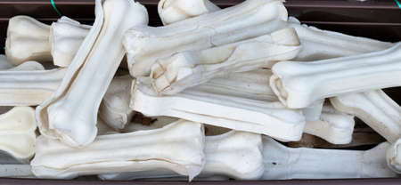 Bones of white color. Awarded for dogs. Nutritious. Photographed in pet store.の写真素材