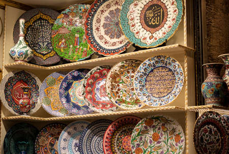 Patterned plates are sold in the store. It contains patterns of Turkish culture.