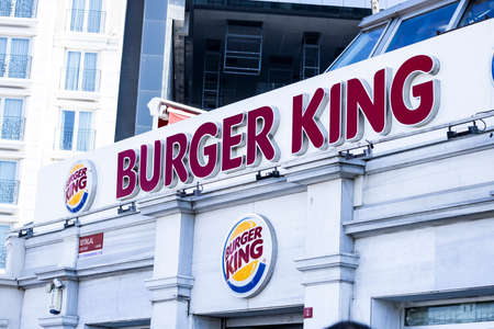 Burger King fast-food in Taksim square and people near it. Burger king sign.