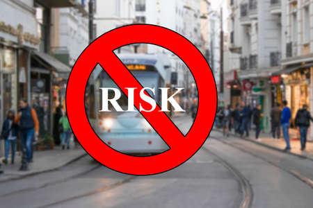 Istanbul, Turkey - February-02.020:The word do not go out has a red color and is framed. An underground underpass in the background. People are outside.の写真素材