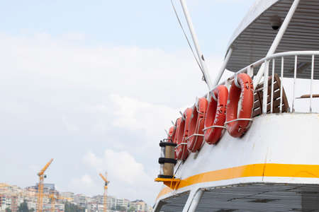 There are many round life jackets on the ship. The back of the ship was photographed. Photo was taken in Turkey.の写真素材