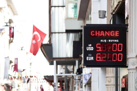 LED signboard of the exchange office. It shows the latest values of the dollar and its euro. Photographed in Istanbul Taksim Square.の写真素材