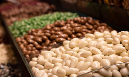 Colorful almond candies. A photo was taken from the side. Apart from sugar, there is almond content. Close-up.の写真素材