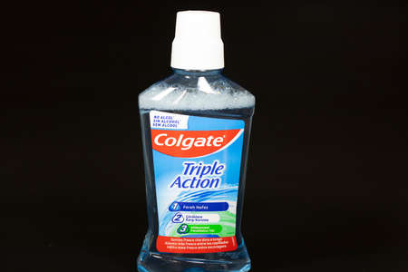 Canakkale, Can, Turkey - March-08.2020: Colgate mouthwash. The photo was taken on a black background in the studio.のeditorial素材