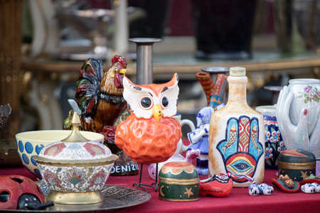 Istanbul, Turkey - October-27.2019 Porcelains in old antique shop close up. There are many items such as vases, bowls, animal figures.のeditorial素材