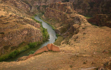 The Aras or Araxes is a river that starts in Turkey and then flows along the borders between Turkey and Armenia. Sunsetの写真素材