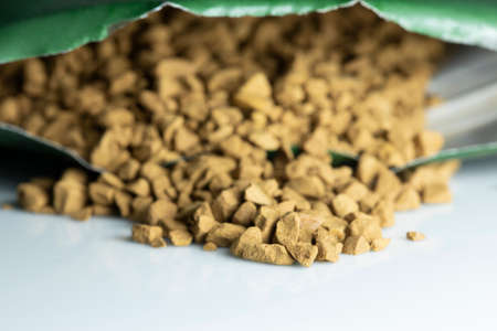 Raw coffee grains in sacks close up.の写真素材