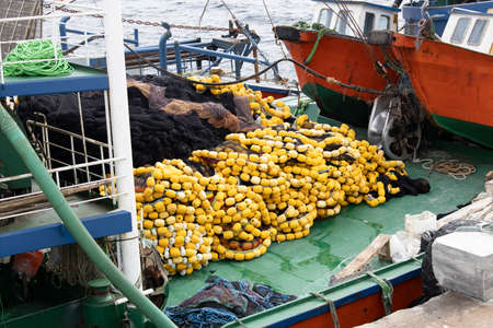 Fishing nets on the boat. There are yellow balls on it. Turkeyの写真素材