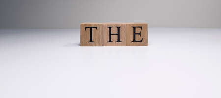 The word from wooden cubes on white background. Photographed in the studio and in spot light.の写真素材