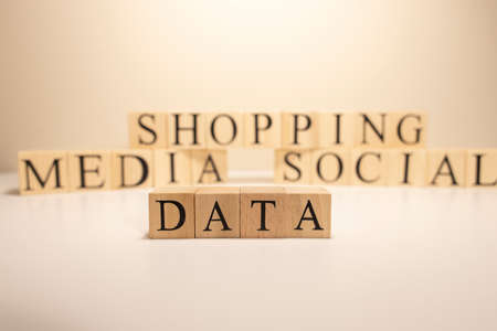 Data, shopping, social, media words written from wooden cubes.の写真素材